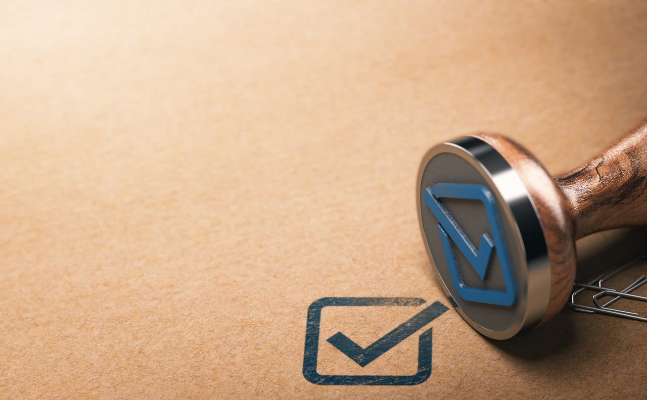 Blue check mark stamped on a neutral background